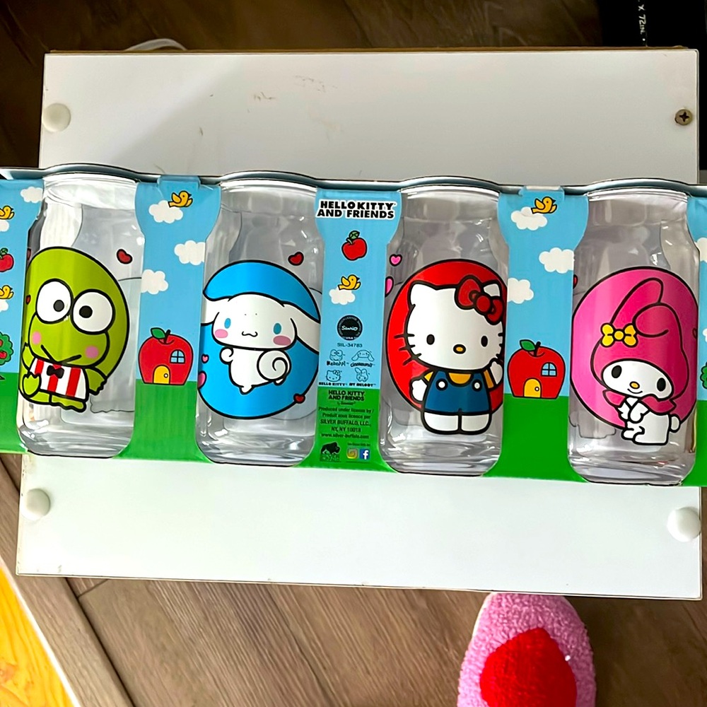 NIB! Set of four Hello Kitty and friends Glassware Set. 16 ounces each